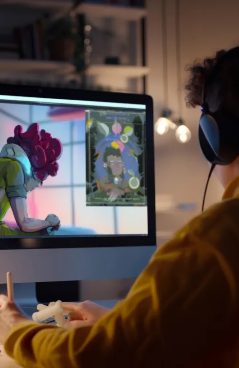 Man working on motion graphics on a computer, thumbnail image